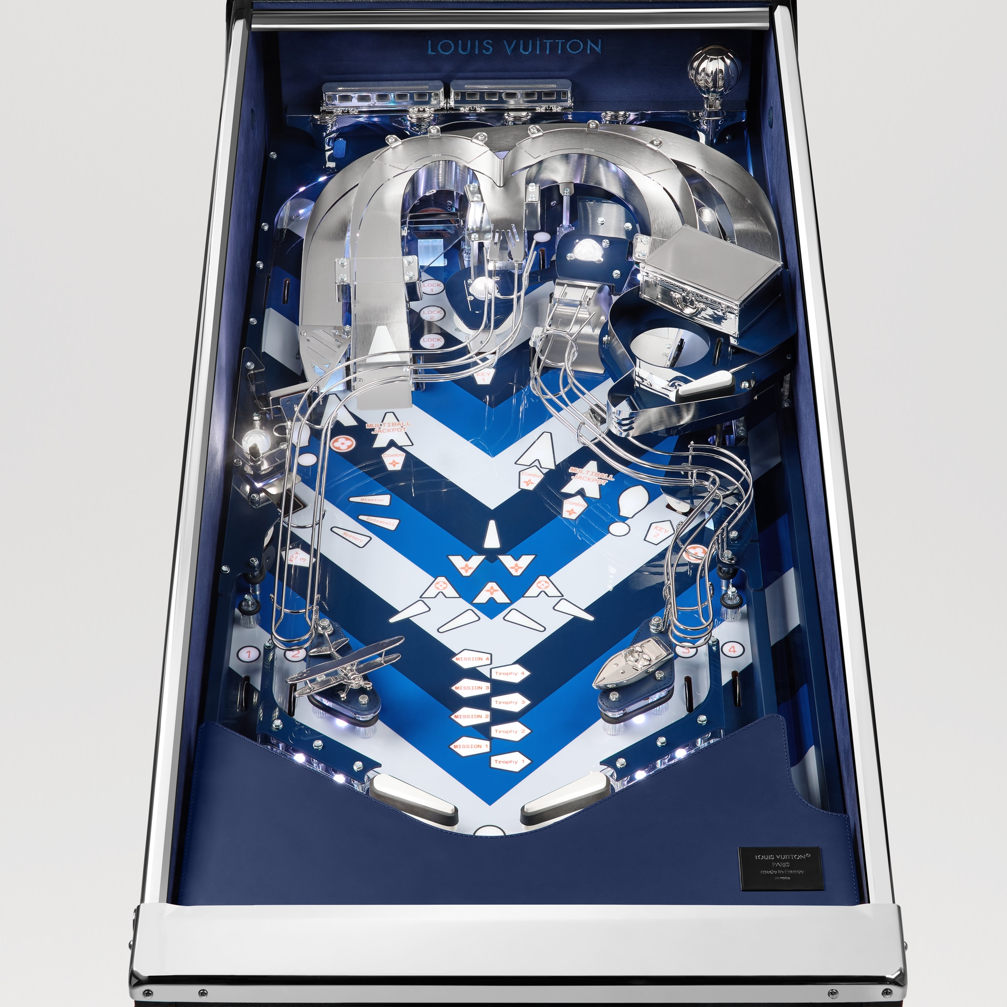 Flipper Toile Monogram Malles, Voyage et Maison Sport et jeux } | LOUIS VUITTON (Zoom produit)