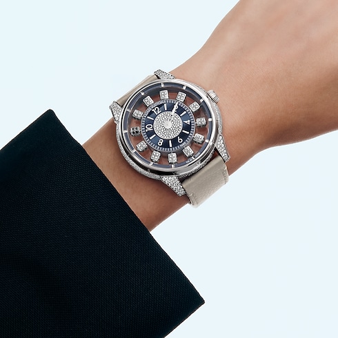 Montre Tambour Taiko Spin Time Air, Automatique, 42,5 mm, or blanc, œil de faucon et diamants Montres Toutes les montres } | LOUIS VUITTON (Zoom produit)