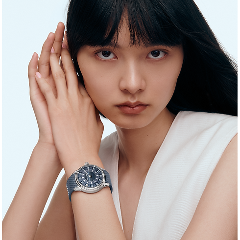 Montre Tambour Spin Time, automatique, 39,5 mm, or blanc, œil de faucon et diamants vue détaillée