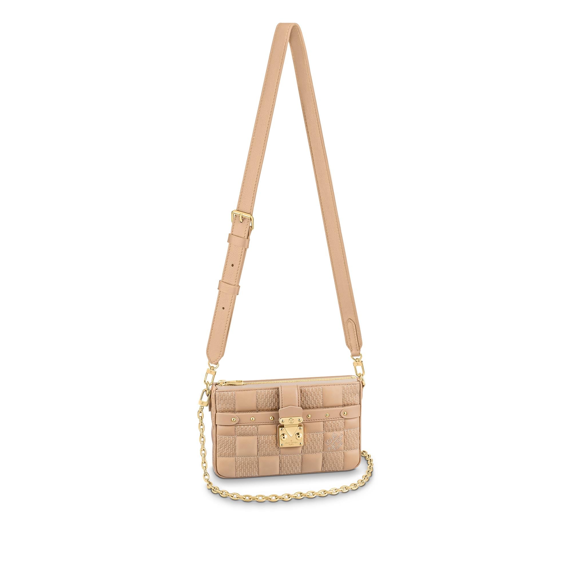 Pochette Troca H27 - Portefeuilles et petite maroquinerie de luxe | Femme |  LOUIS VUITTON